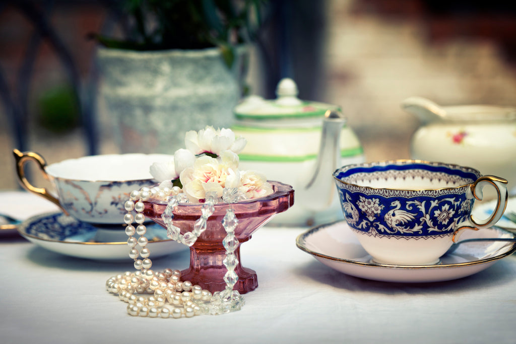 Eclectic vintage bone china. Cross-processed image.