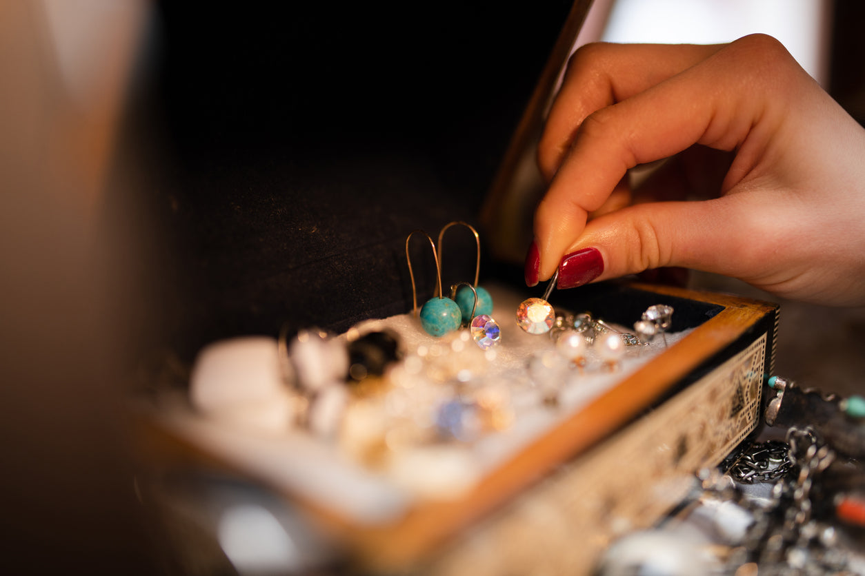 Women's hands choosing accessories