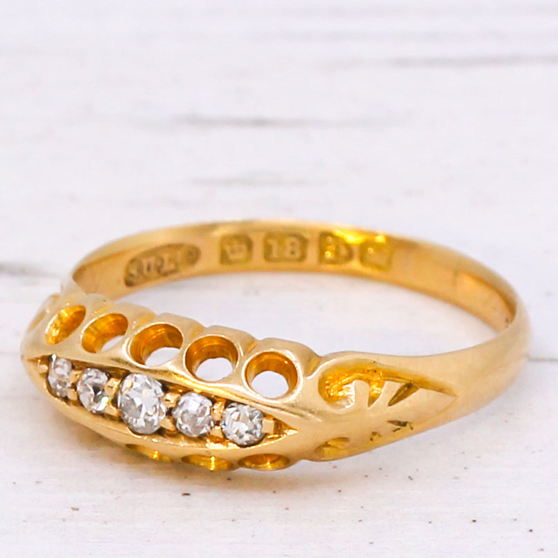 Antique 0.13 Carat Old Cut Diamond Five Stone Ring, dated 1905