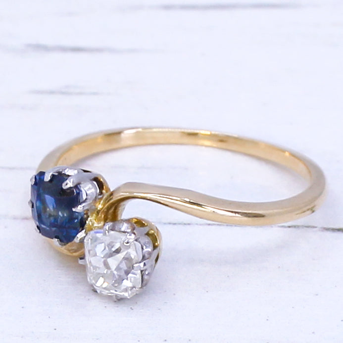 Edwardian 0.51 Carat Sapphire & 0.50 Carat Diamond Crossover Ring, circa 1905