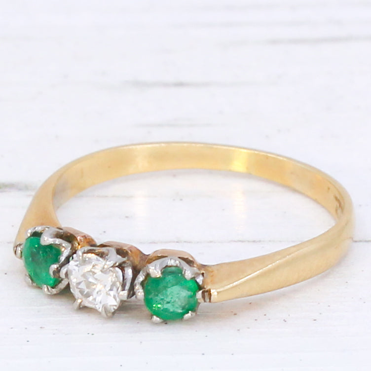 vintage emerald diamond three stone