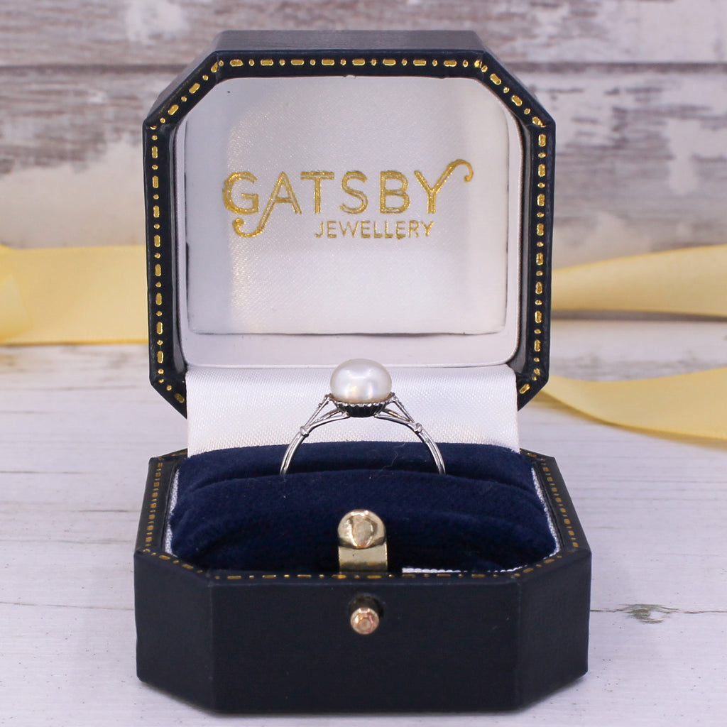 natural pearl solitaire ring