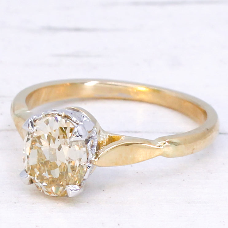 Art Deco 1.20 Carat Fancy Orangy Yellow Old Oval Cut Diamond Ring, circa 1920