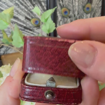 vintage emerald diamond three stone